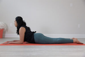 A woman lying on a yoga