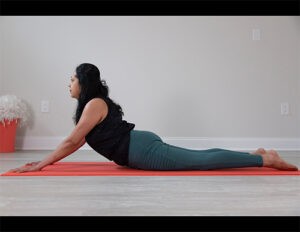 A woman doing yoga poses